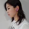 KIMSUMBLE_superconnectr_true_wireless_headset_on_ears.jpg